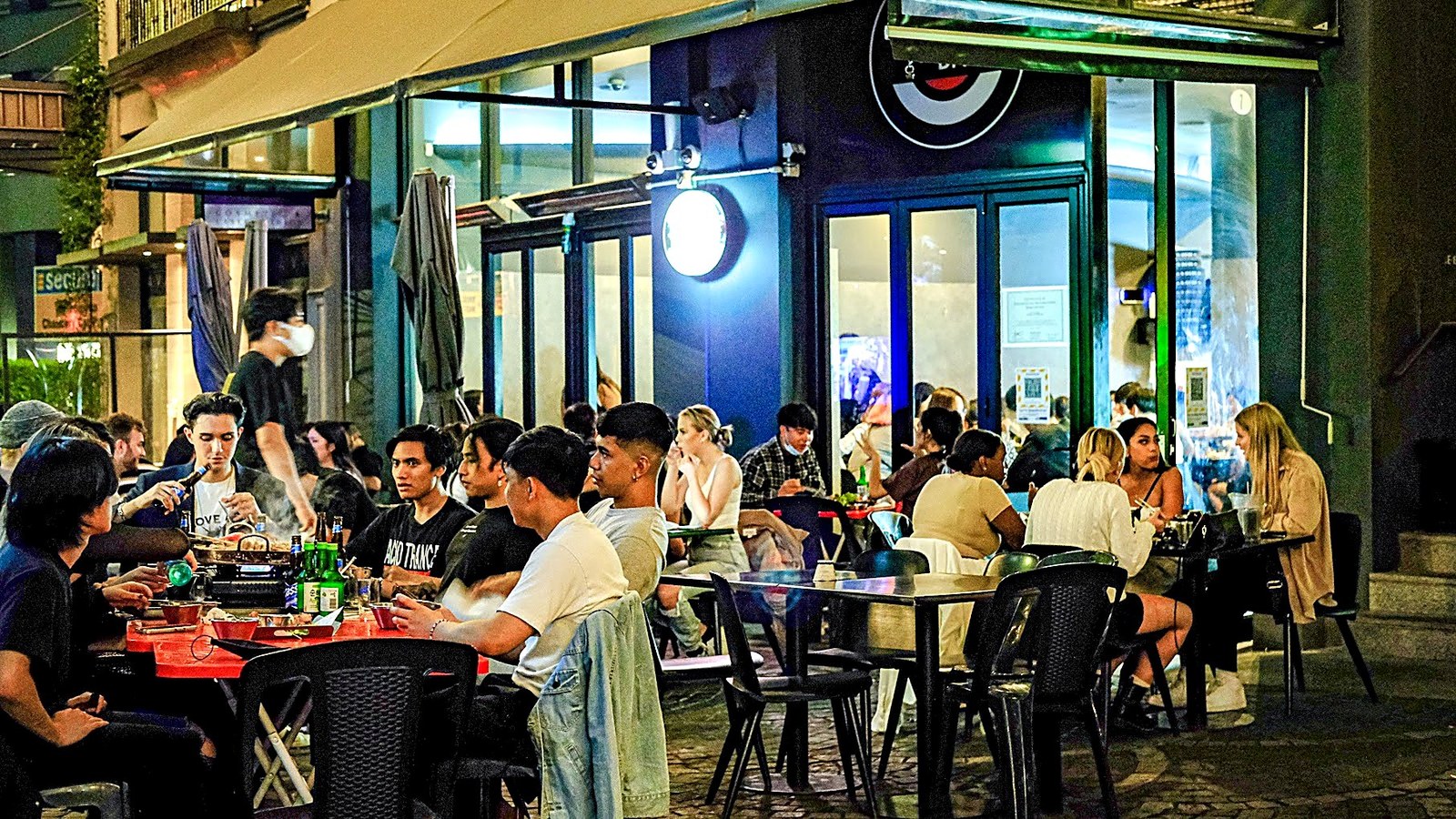 Bustling Bacons Lane outdoor lane dining and nightlife scene at OBAR Korean Restaurant Chancery Square Auckland